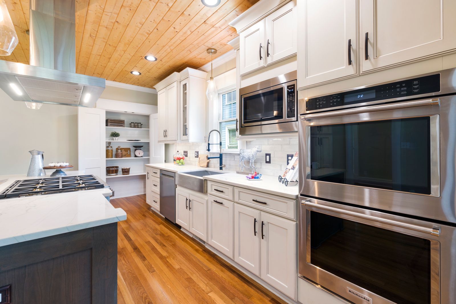 Remodeled kitchen with white cabinets